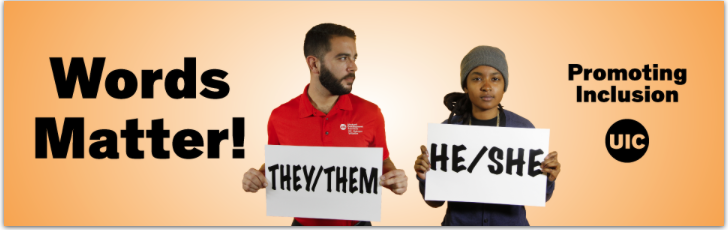 image of two people holding pronoun signs